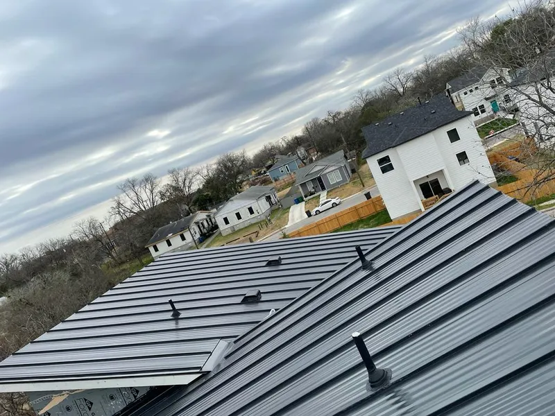 Standing seam metal roof panels with vents for Skylight Repair in Maryville